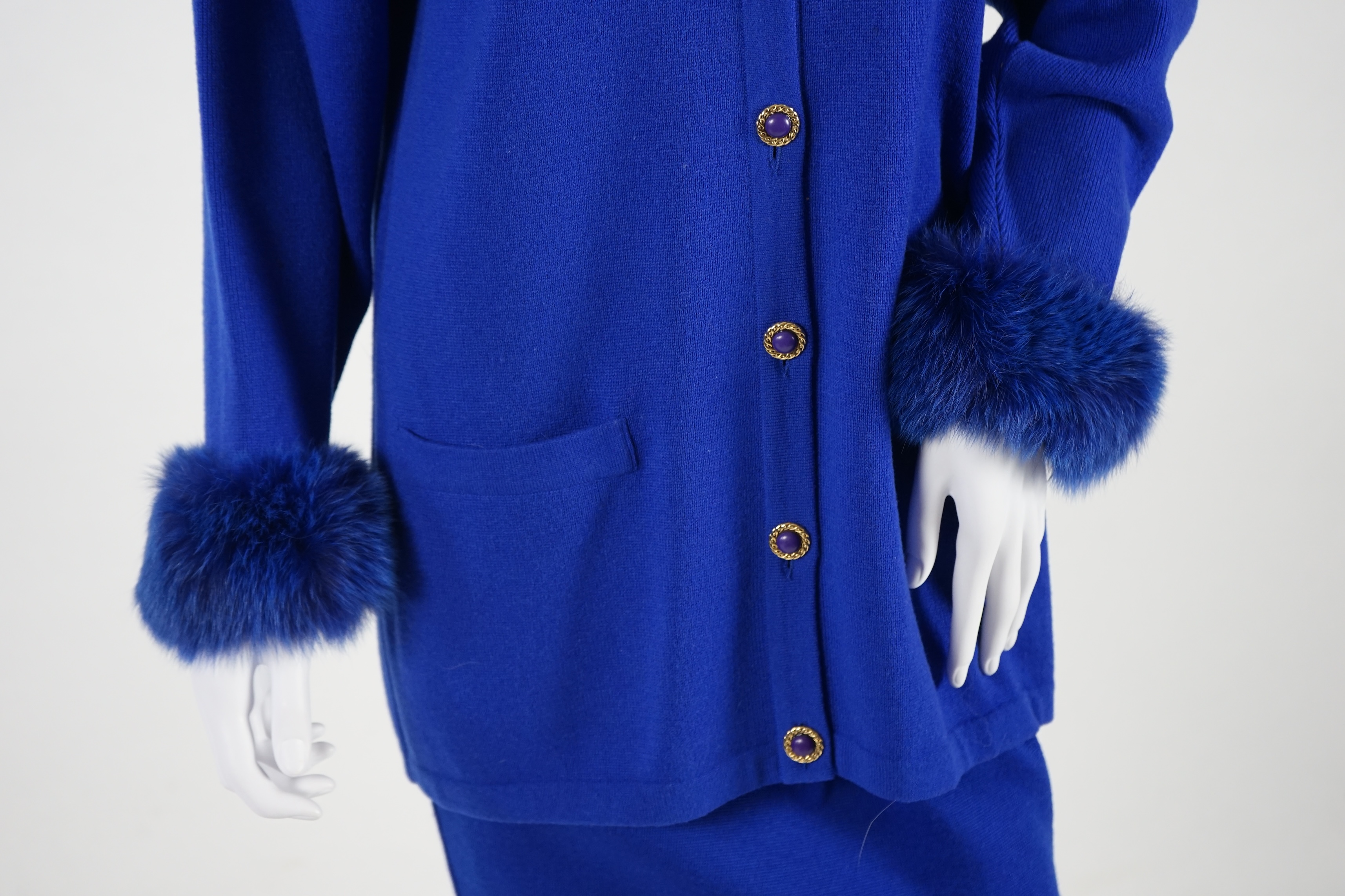 A Vera da Pozzo knitted royal blue suit with fur detail, knitted dress with fur cuffs and additional knitted skirt. Approx size 10-12 Proceeds to Happy Paws Puppy Rescue